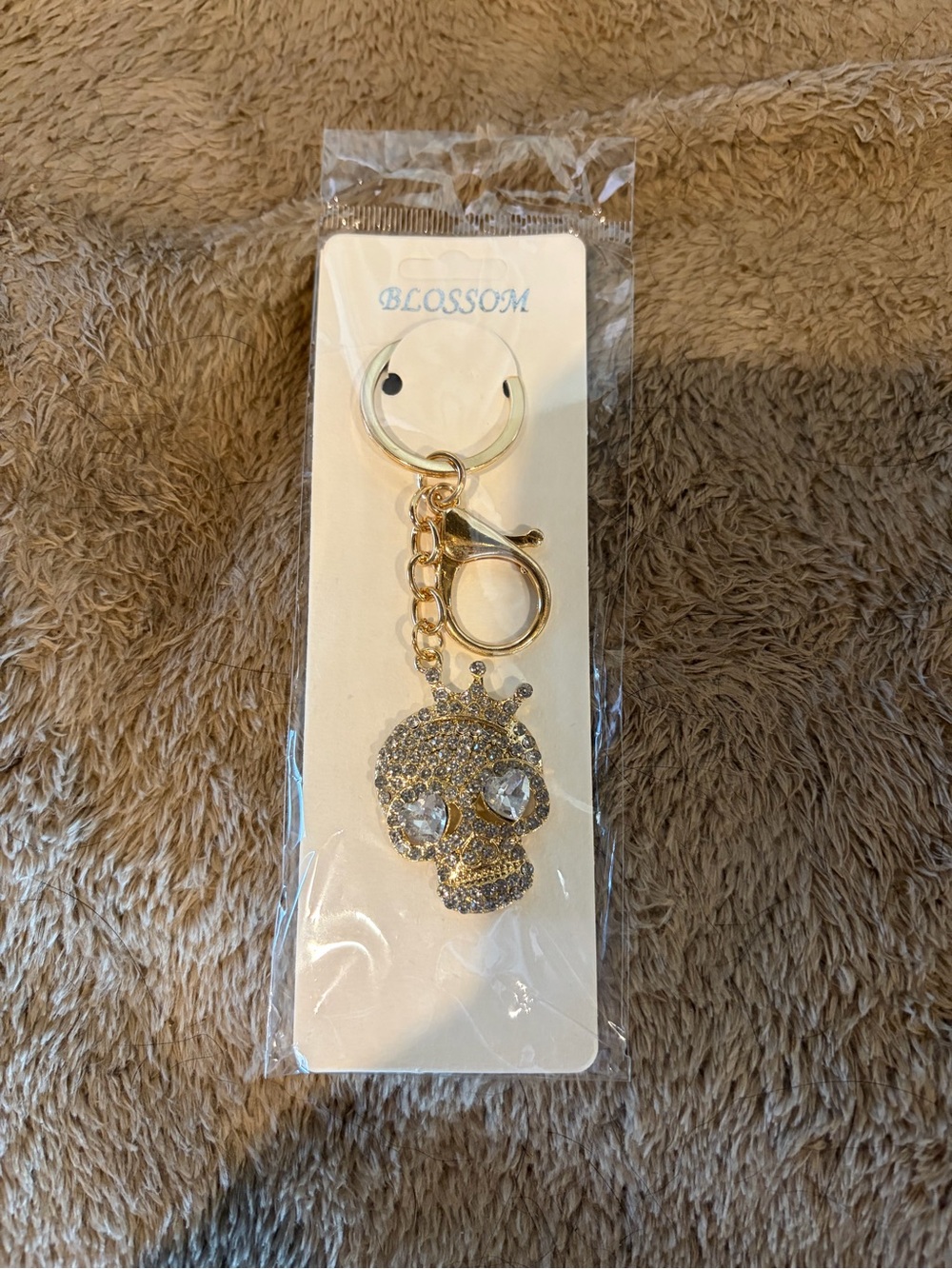 Gold and rhinestone skull bag charm/keychain